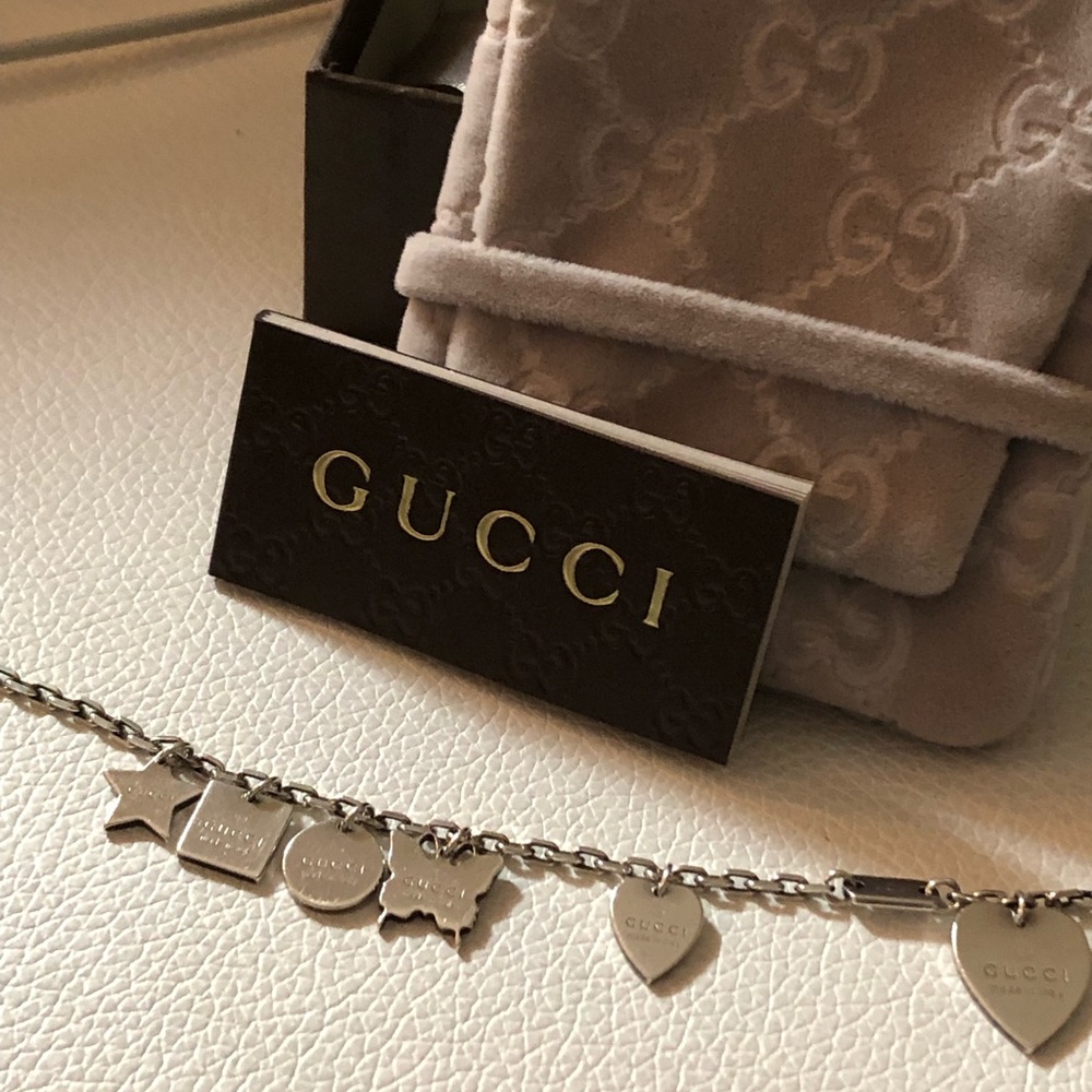 Authentic Gucci Bracelet trademark charms silver.